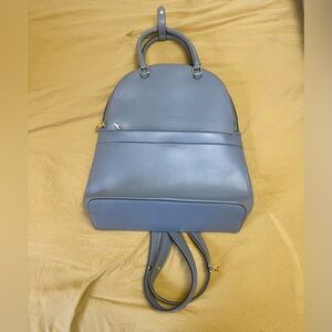 A new day | Faux gray leather backpack